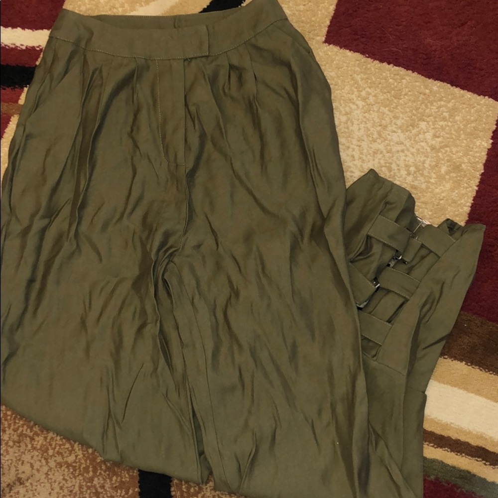 Green trousers with ankle grunge design